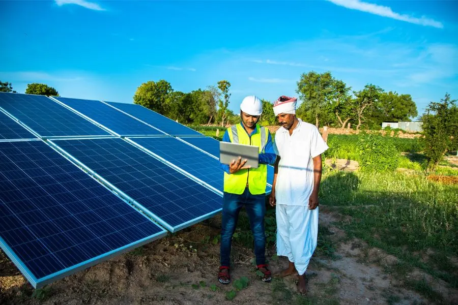 Our engineer with a customer at a solar installation
